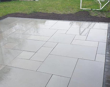 grey paving, patio area with dark border