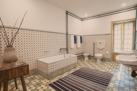 old tiles bathroom coliving