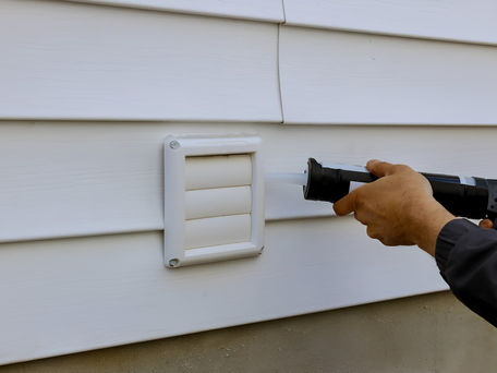 Siding being sealed 