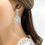 Thumbnail: Silver square crystal statement bridal earrings