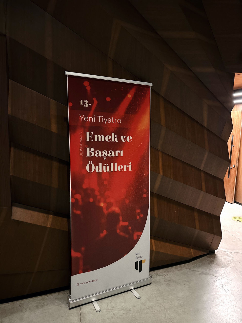 Freestanding red event banner for the 13th International Yeni Tiyatro Awards.