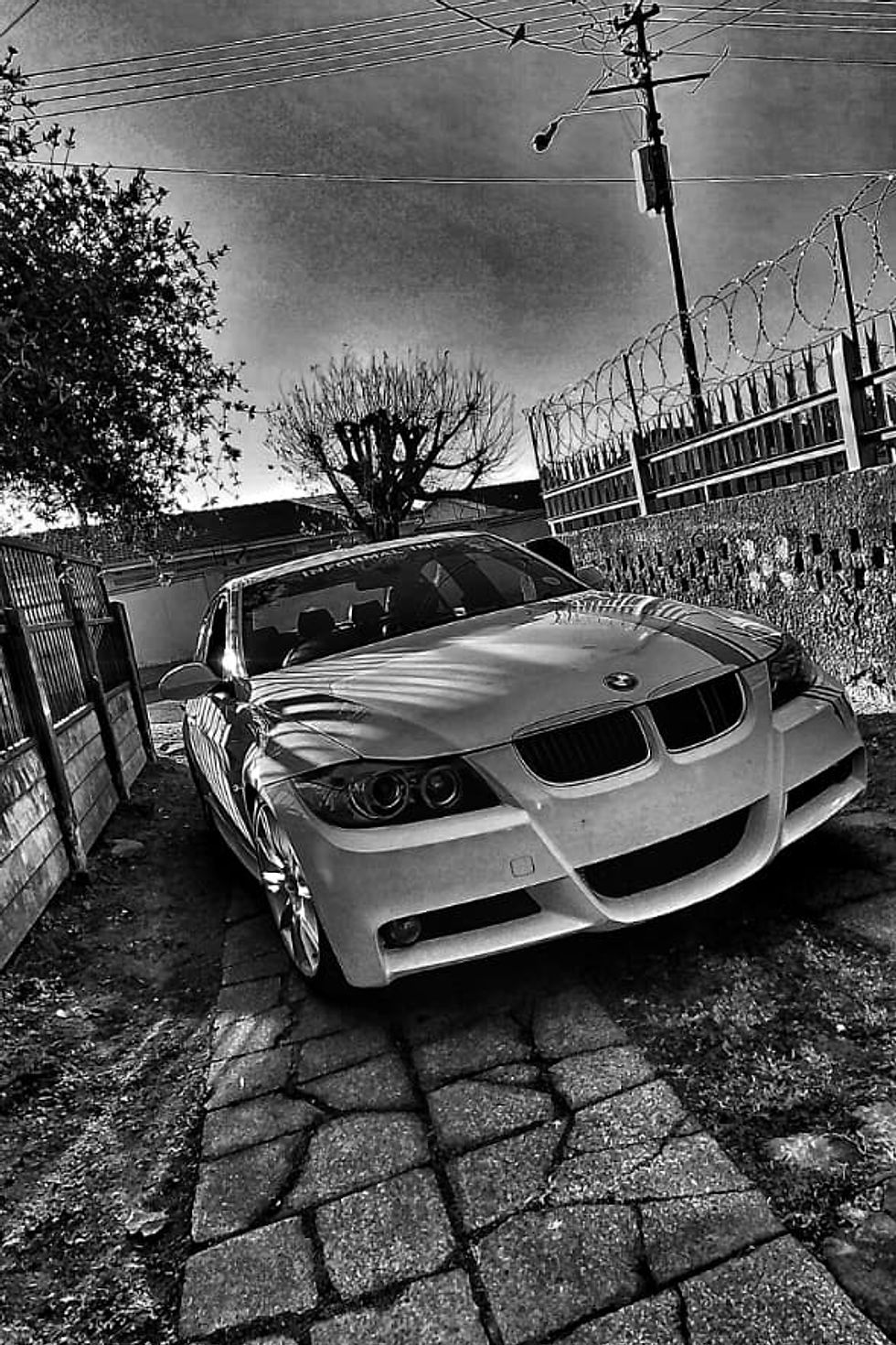 Black and white photograph of a BMW car