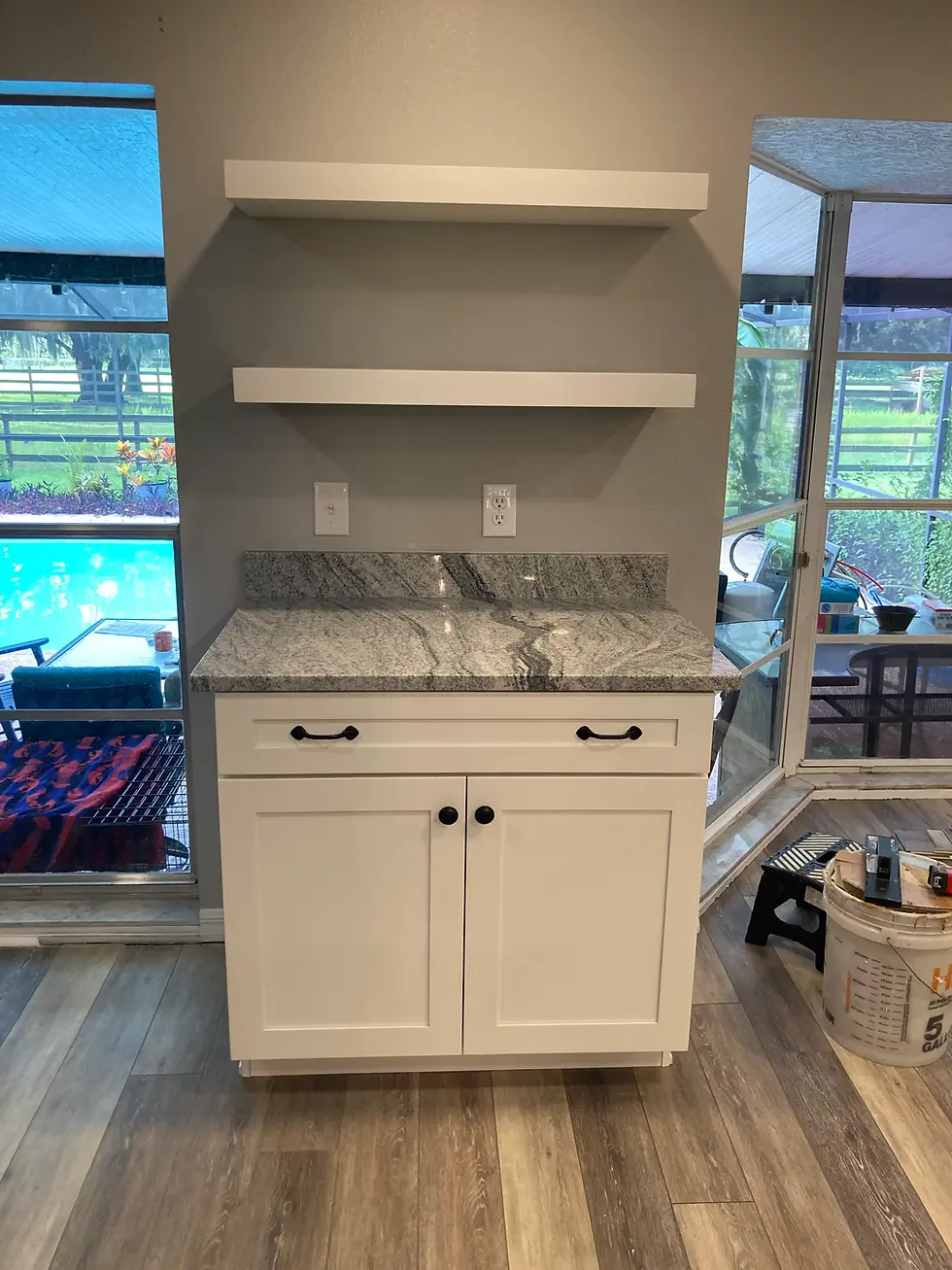 Beautifully remodeled kitchen with updated cabinets, countertops, and appliances.