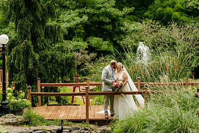 Couple kisses on walking bridge
