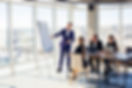 business-people-working-together-modern-office-with-cityscape-view-director-tells-staff-ab