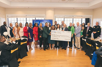 Black Empowerment & Community Council receiving award from the City of St. Cloud Economic Development Director Antranette Forbes in Osceola County, FL