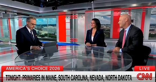 CNN anchor Jake Tpper interviews two panelists. The headline is "Tonight: Primaries in Maine, South Carolina, Nevada, North Dakota"
