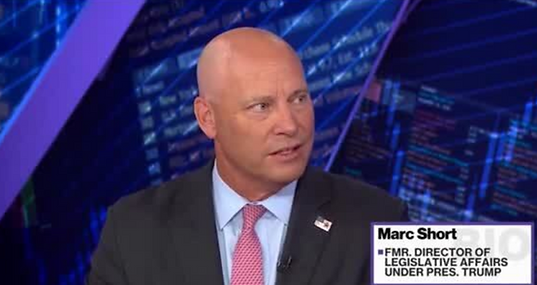 A man in a suit speaks in a news stuido. The bottom of the screen says: "Marc Short, Fmr. Director of Legislative Affairs Under Pres. Trum"