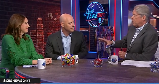 Marc Short speaking with two other panelists on CBS on April 14, 2026.