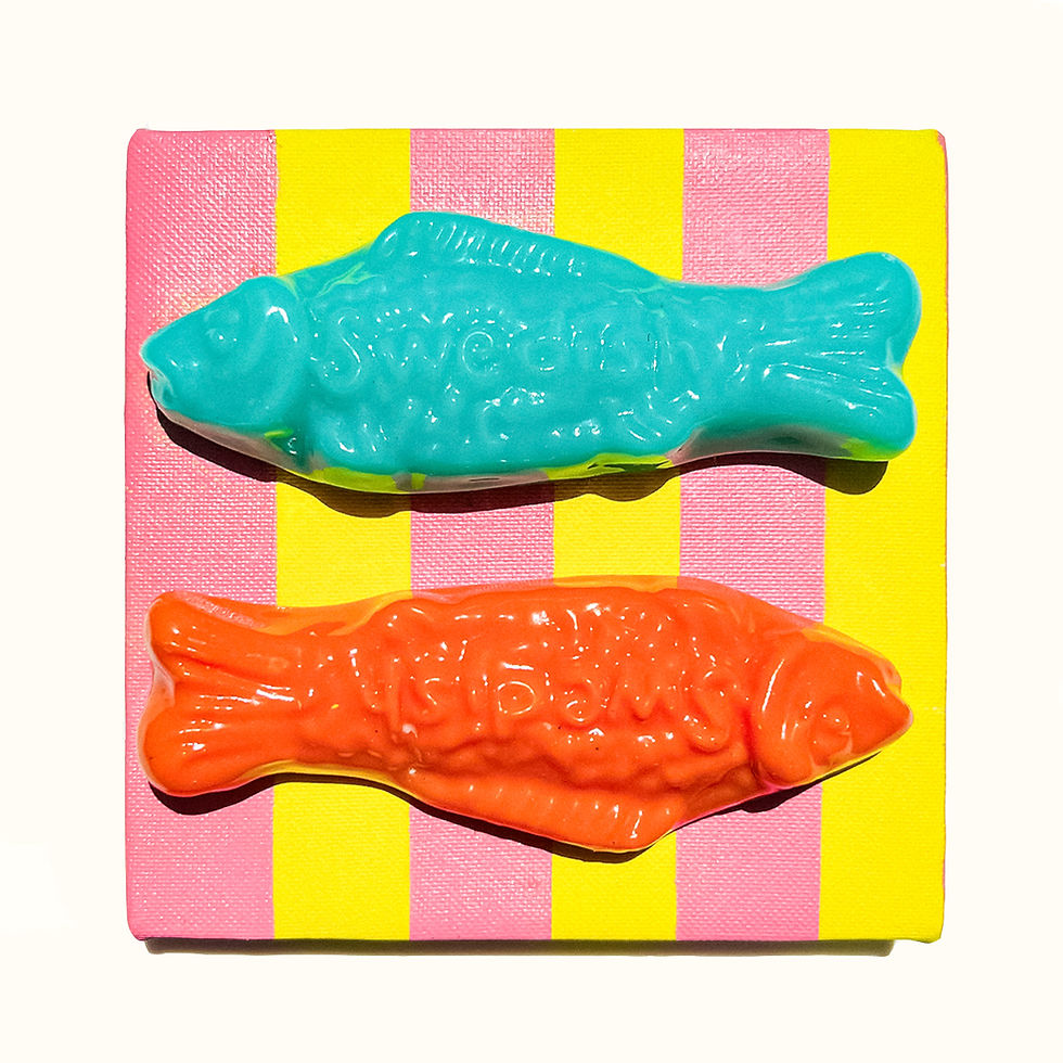 Thumbnail: Two Swedish Fish candies on a striped background.