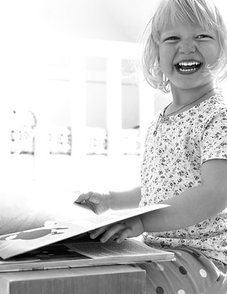 Girl Reading and Laughing_edited_edited_