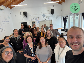 A selfie of Social Care Solutions' facilitator Braden Clark and the participants of the LEAD - Leadership Excellence and Development workshop in Aotearoa/New Zealand