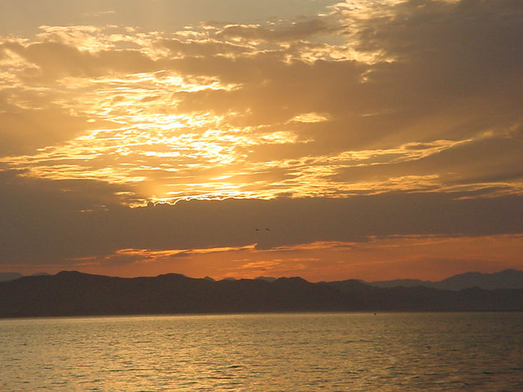 The Adventures of Music 2002. Sunset from Los Pilares anchorages. Calm sunset from Las Pilares anchorage Baha California, Mexico.
