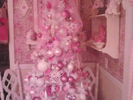 Pink Christmas tree on pink table