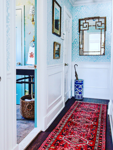 Colorful hallway with antique rug