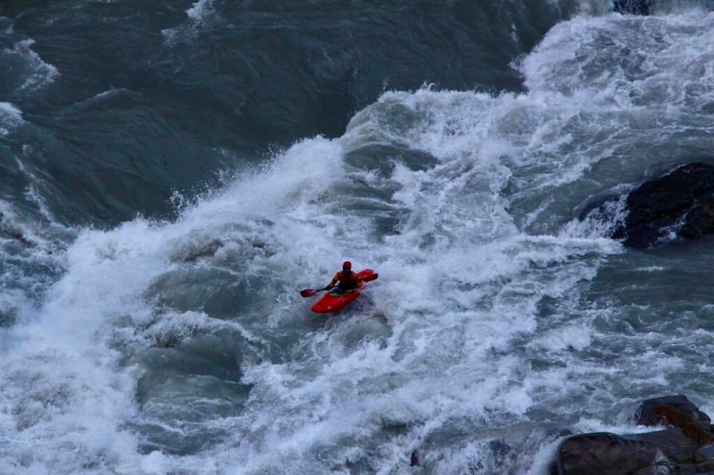 Frazer navigates around a huge hole on the Indus River, Pakistan.