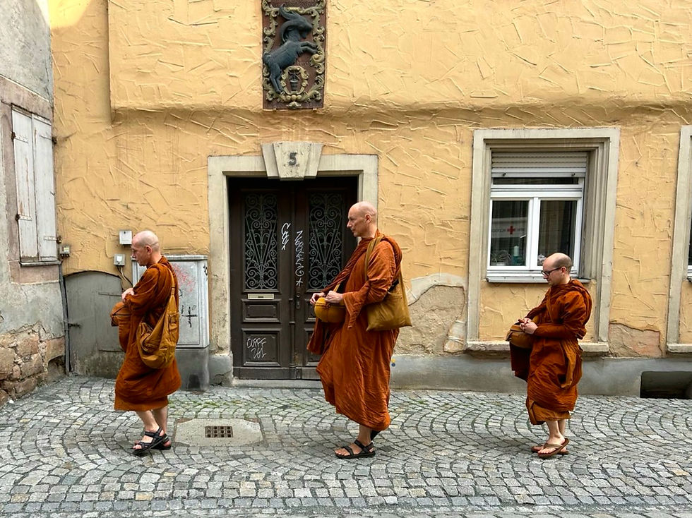 Ajahn Cattamalo, Ajahn Dhammasiha, Tan Yodhako on Almsround in Germany