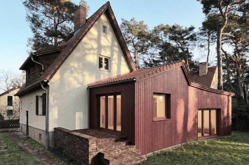 3D-Visualisierung eines zirkulären Anbaus an ein Einfamilienhaus. Ein Entwurf von SXG Architektur.