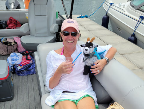 Boat Goat Captain Service at Lake of the Ozarks, featuring experienced captains and happy guests enjoying a top-rated boating adventure with excellent reviews.
