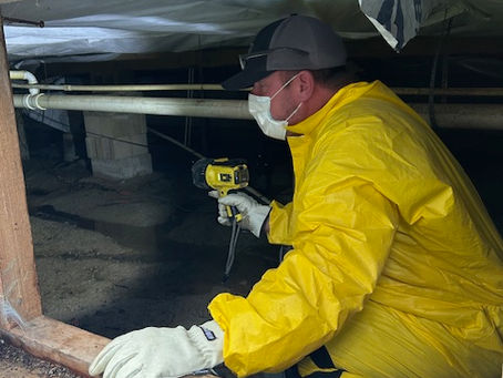 Steve from Advanced Crawlspace Solutions inspecting a crawlspace for moisture and damage