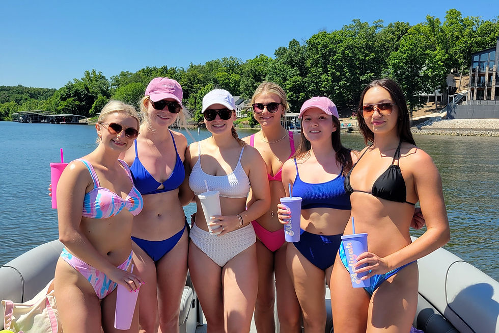Group of ladies enjoying a summer boat ride at Lake of the Ozarks arranged by Boat Goat