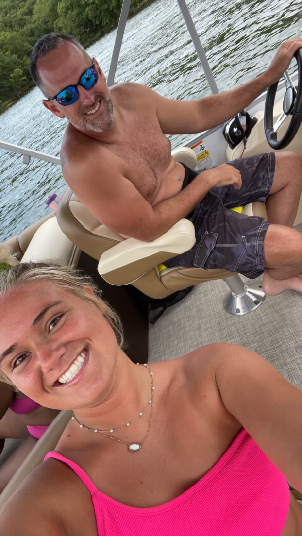 Captain Chris with guests during a group boat charter on Lake of the Ozarks