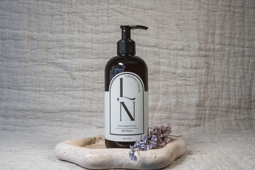 Close-up of LakeHouse Naturals 12 oz shampoo highlighting lightweight formula and naturally derived cleansing ingredients.