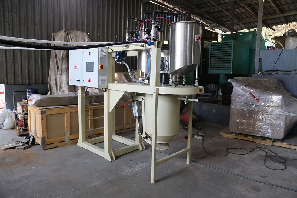 The DBF-120 Discontinuous Block Foaming Machine by FinCorp, showing its metal frame, dual stainless-steel mixing tanks on top, and an integrated control panel with a touchscreen on the front.