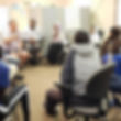 Care coordinator meeting with community members