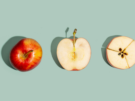 A whole apple, a cross section of an apple, and a cross section cut into thirds