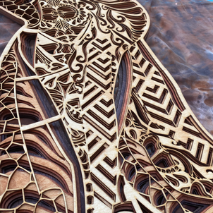 Large wall art piece of a nude woman extending arms out behind back, with palms to the sky. Multi-layered wood art piece, inspired by graffiti art and figurative studies.