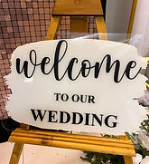 White Painted Back Acrylic - Black Vinyl Welcome To Our Wedding Sign