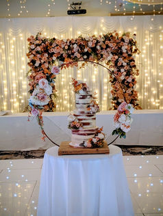 Orianna floral arch and cake stand