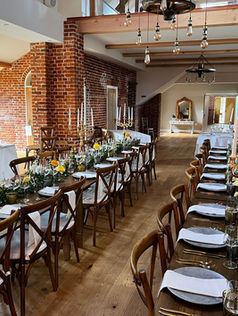 Candlearbra centrepieces at Reymerston Hall