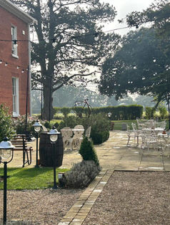 Outdoor festoon lighting at reymerston hall