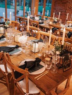 Candle sticks and lanterns centre pieces at Reymerston hall 