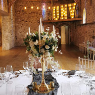 Rustic Letters, Grey Cheesecloth Runner and Candelabra with Artificial Florals