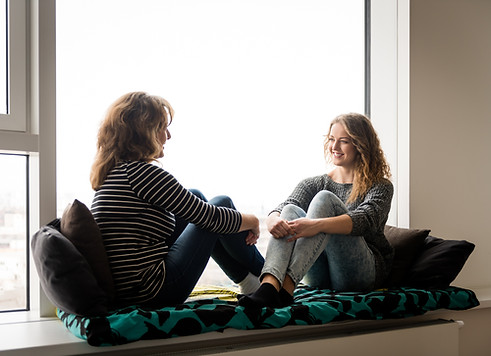 Mother and daughter talking. Spending ti