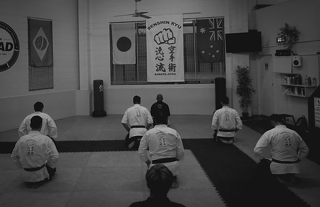 Students bowing in to start the self defense class