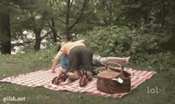 couple trying to have sex in forest