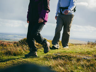 A couple walking in the hills