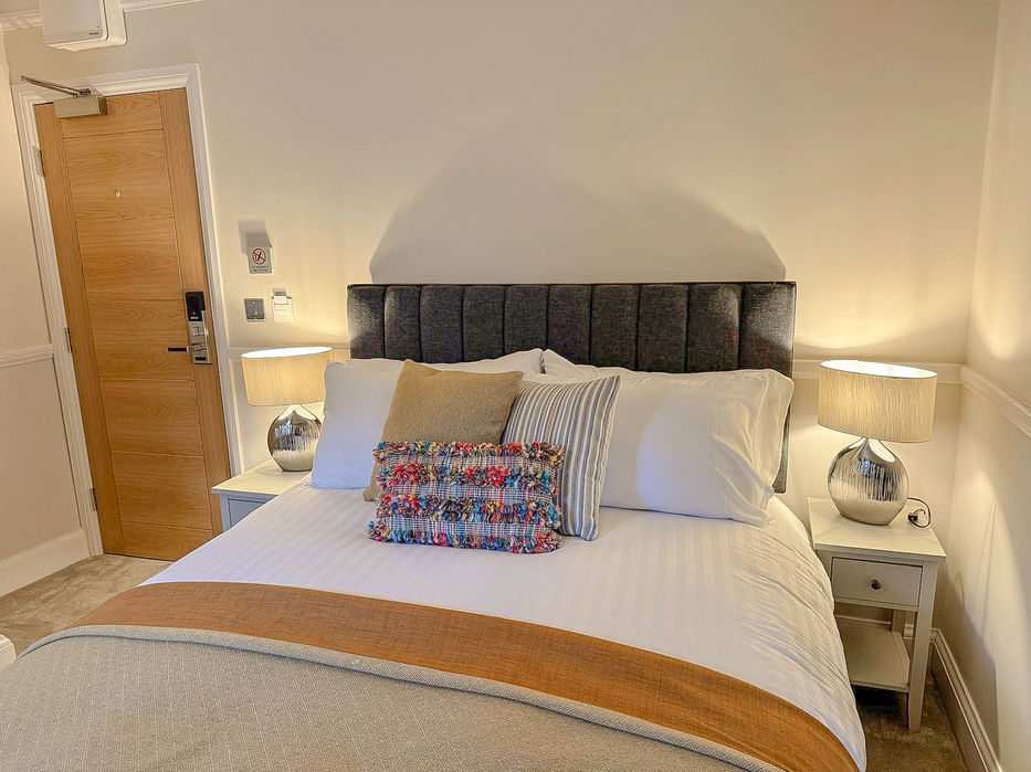 Luxury bed in the hotel room