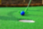golf ball next to hole2.jpg