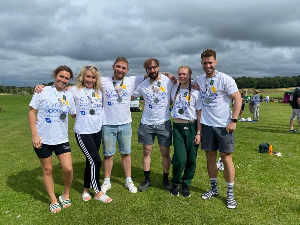 Team BQI take part in Mudnificent 7 to raise money for
