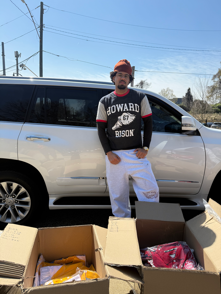 Tahir Murray Gives Away Items from LEGACY, HISTORY, PRIDE for AUC Students to Upcycle