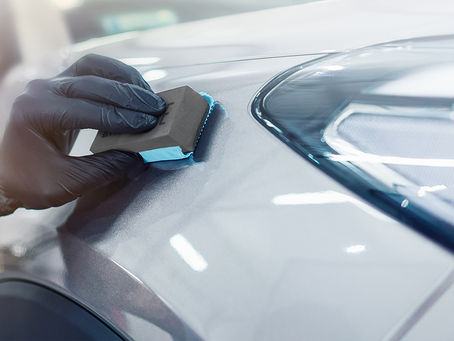 What are the advantages of hiring a car detailing service?