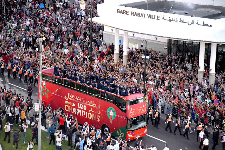 Fans flood the streets of Rabat as Morocco’s U-20 World Cup champions parade past Gare Rabat Ville, celebrating the nation’s historic football triumph.