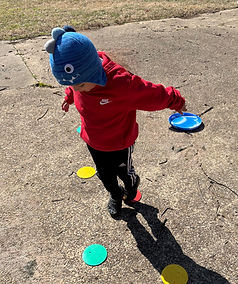 Child enjoying outdoor play at Bright Hands Academy in Annandale, Virginia