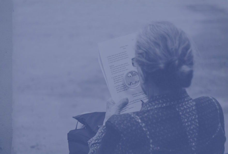 elderly woman reading