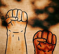 illustration of two fists of different skin tones